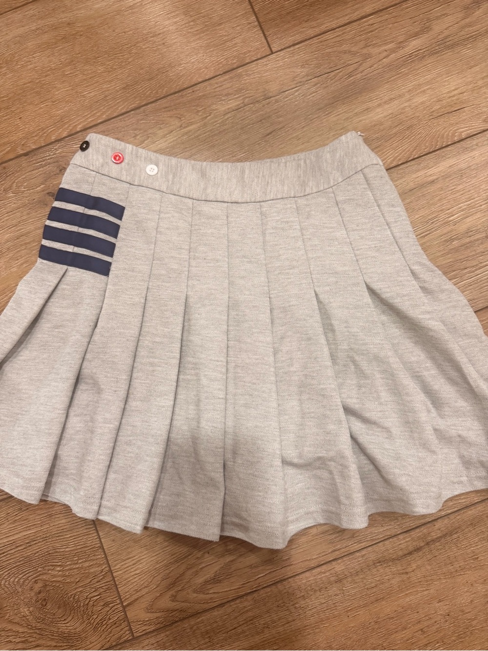 Light Gray Pleated Skirt with Navy Stripe Tab